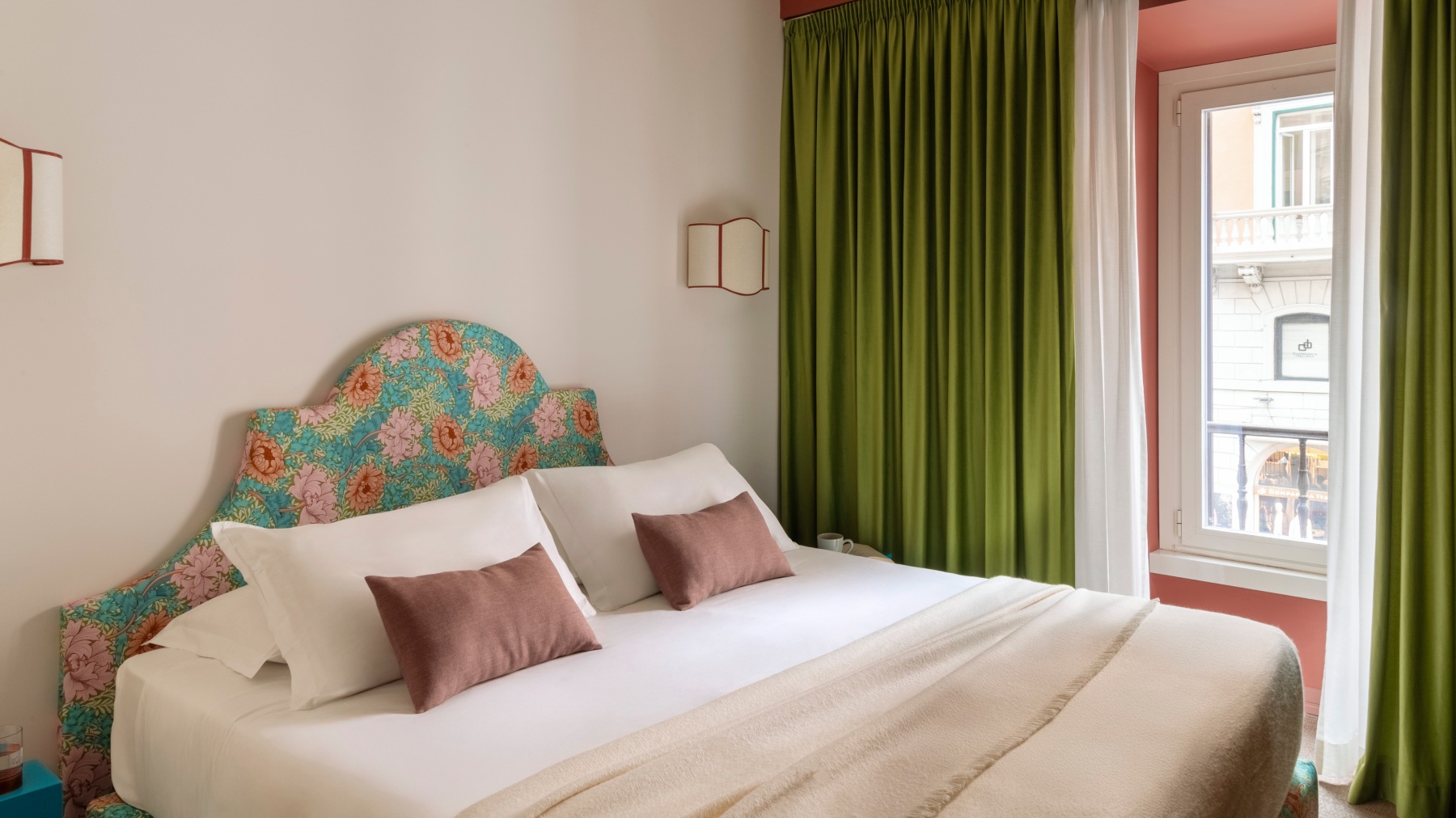 Elegant double room with floral headboard and green curtains, natural light and Rome view – The 4 Rooms, BZAR hotels in Rome